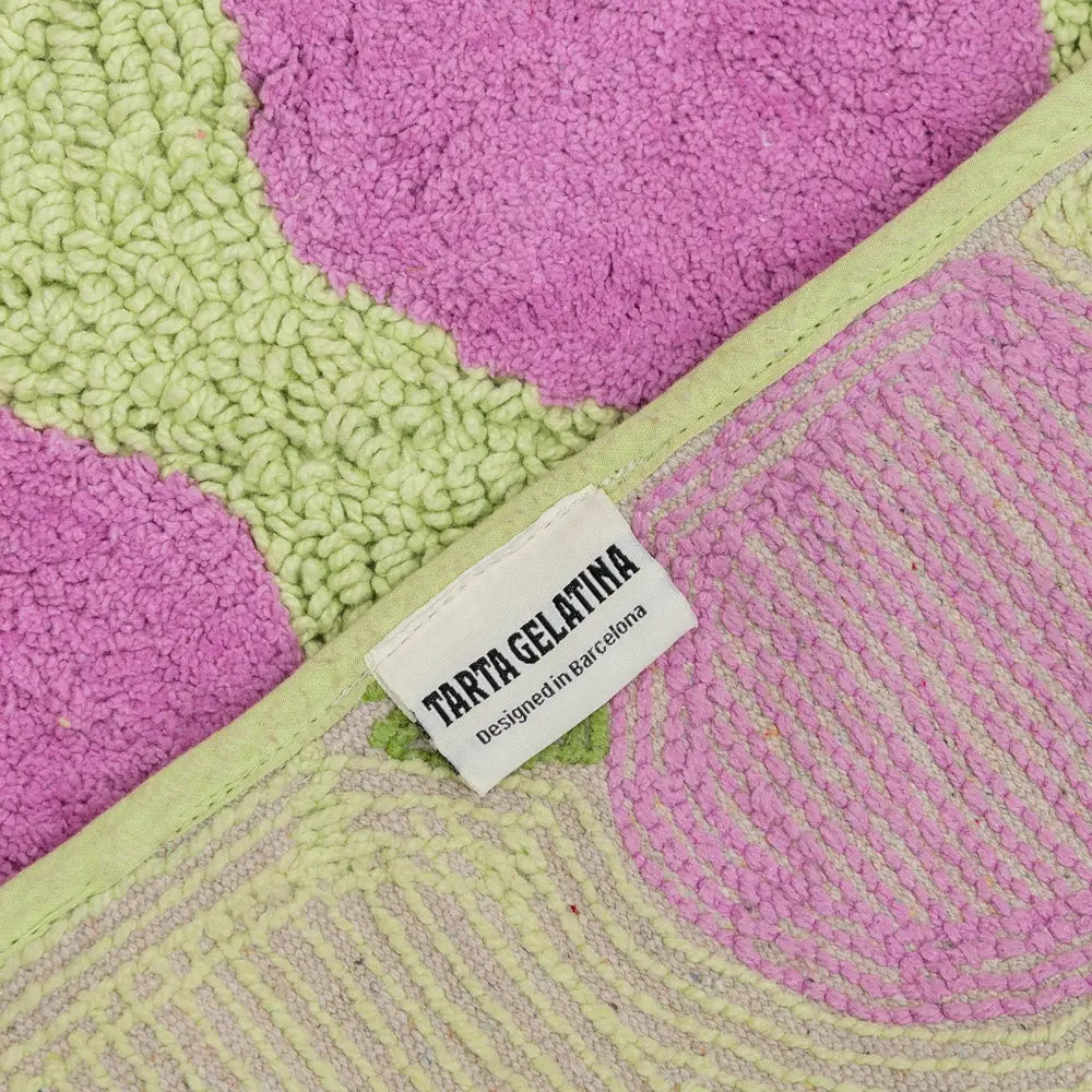 Close-up of a textured fabric with a &