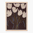 Wall art featuring floral tulip flowers in light beige with blue and olive stems on a dark brown background, enclosed in a light natural wood frame.