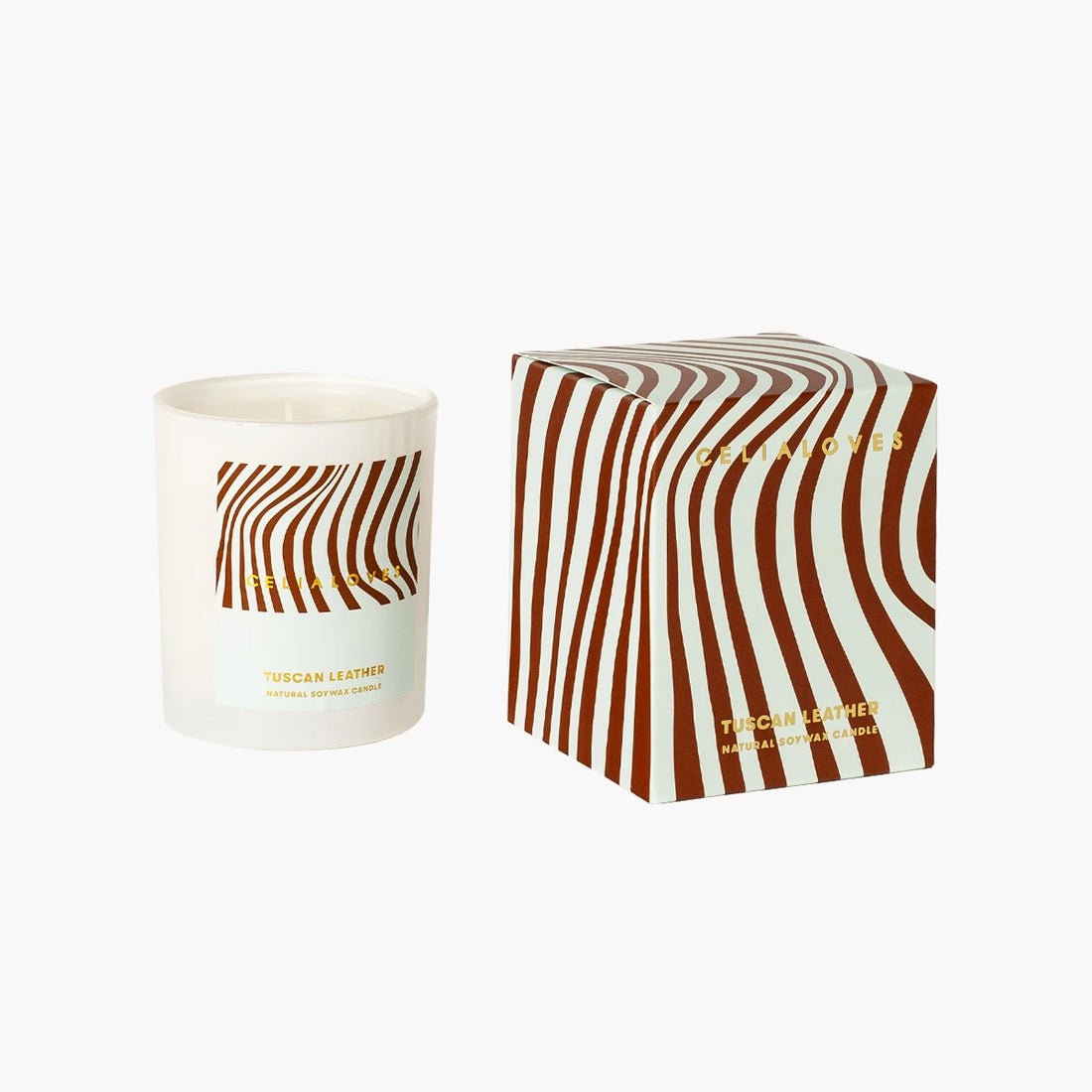 Candle with wavy brown design and matching box on a white background