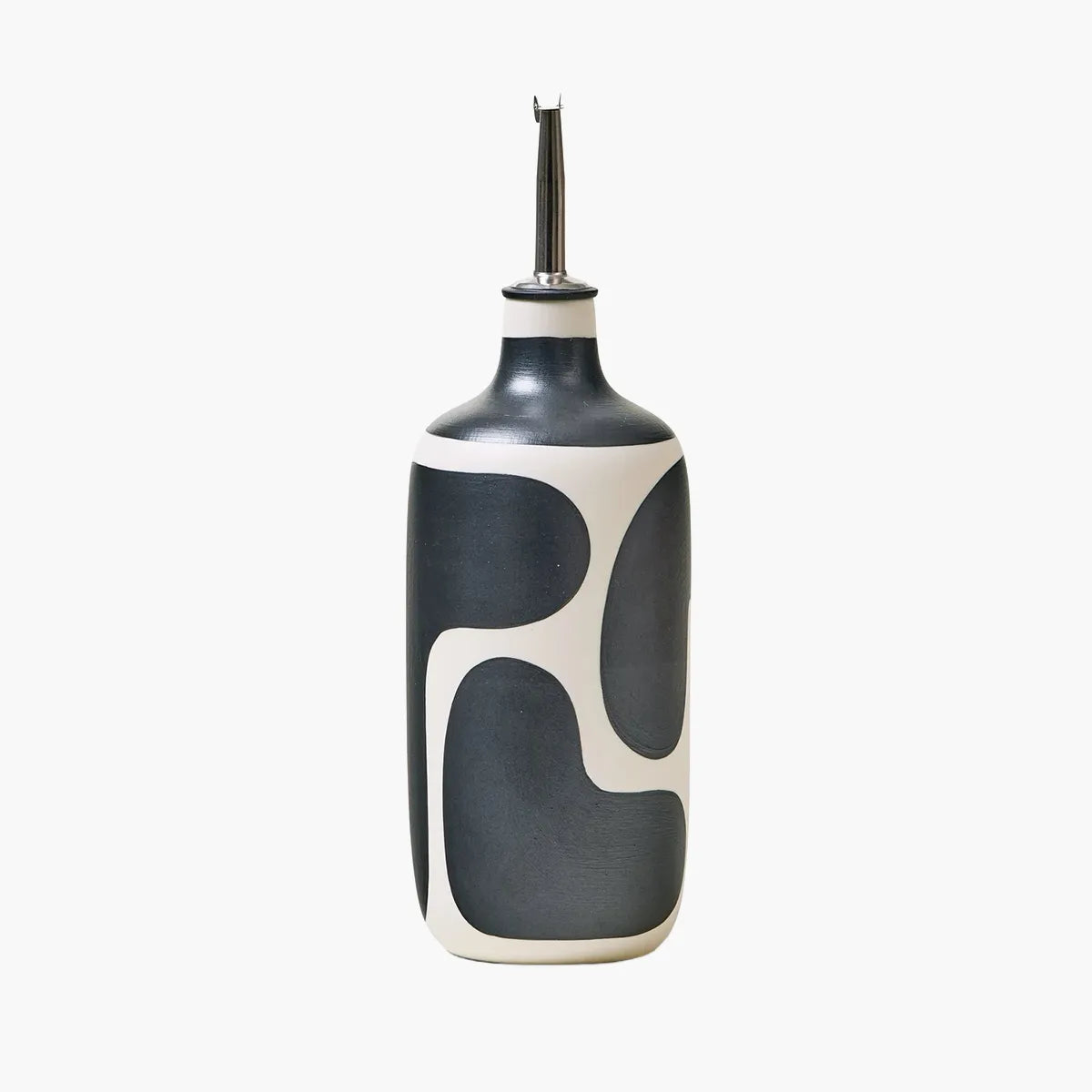Black and white patterned ceramic bottle on a white background