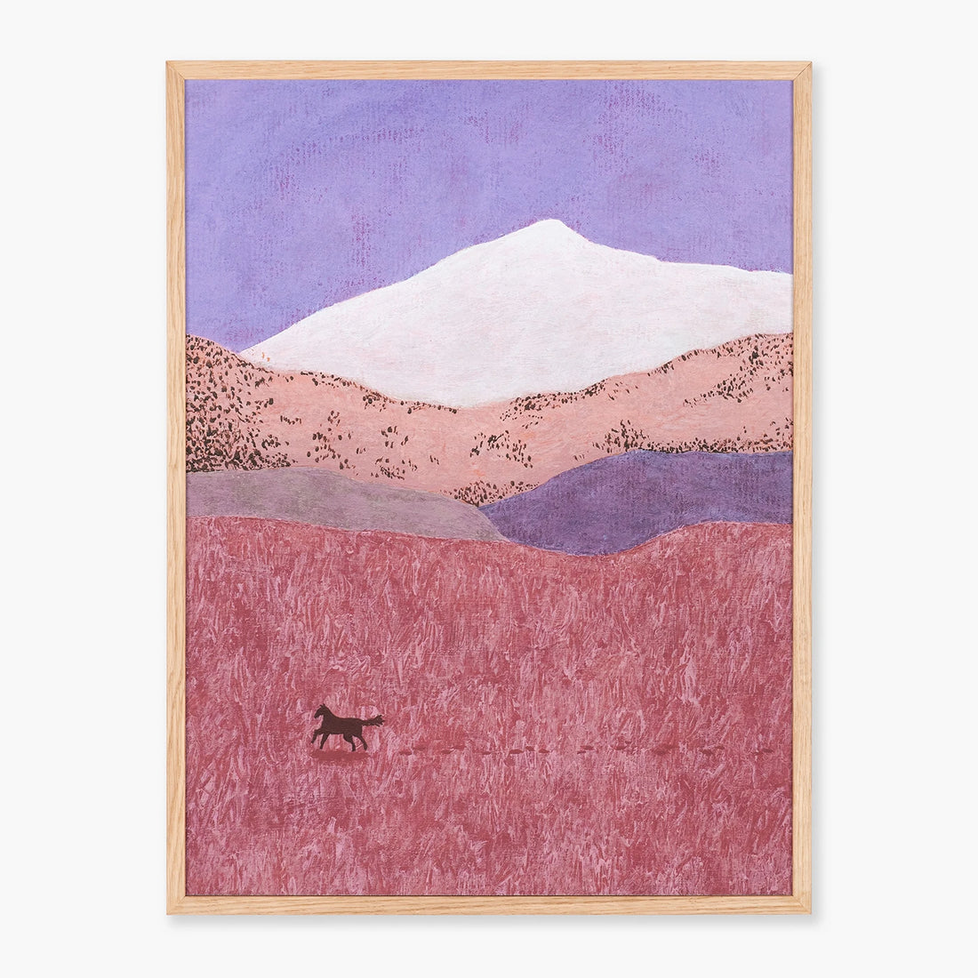 Wall art print featuring a landscape with a white snow-capped mountain under a lavender sky, pink hills, and a small dark horse silhouette in a textured field, shown against a light gray background.