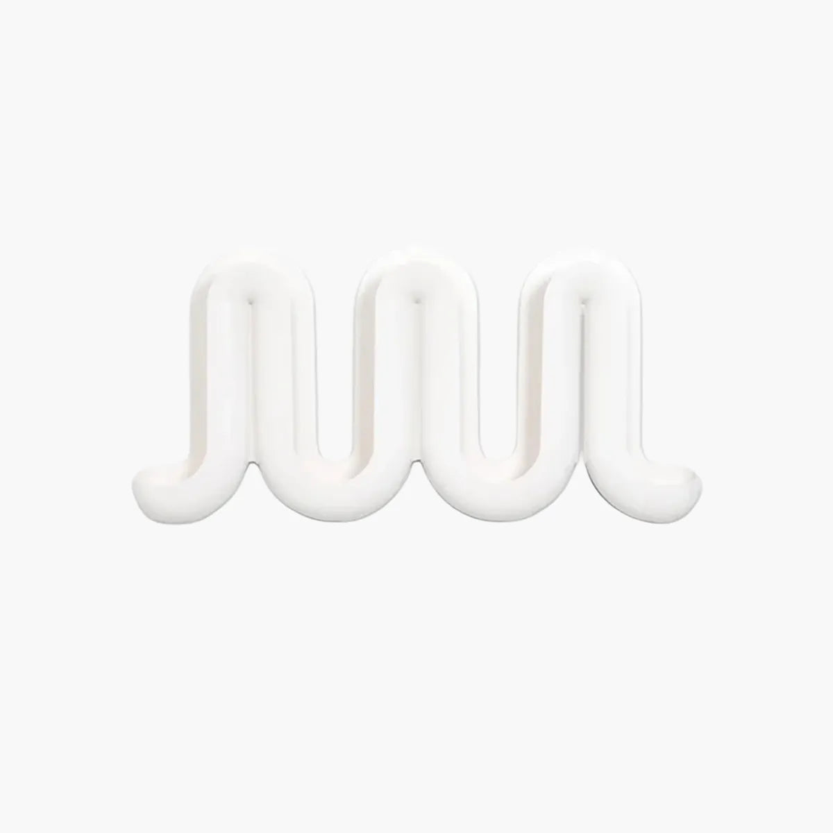 A white, wavy, three-dimensional Heller Swell Wall Catchall on a plain white background.