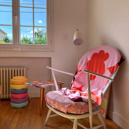Petal pop Mini Knit Blanket by Slowdown Studio designed in collaboration with artist Micke Lindebergh