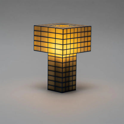 A Ridezign Tesser 5:8 table lamp shaped like the letter &