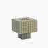A Ridezign Tesser XL 5:3 Lamp in Butter with grids and squares on a white background.
