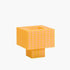 A Ridezign Tesser XL 5:3 Lamp in Guava with grids and squares on a white background.