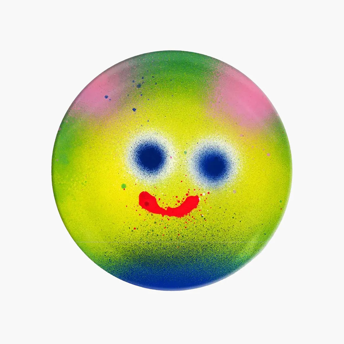Colorful plate with a smiley face design on a white background