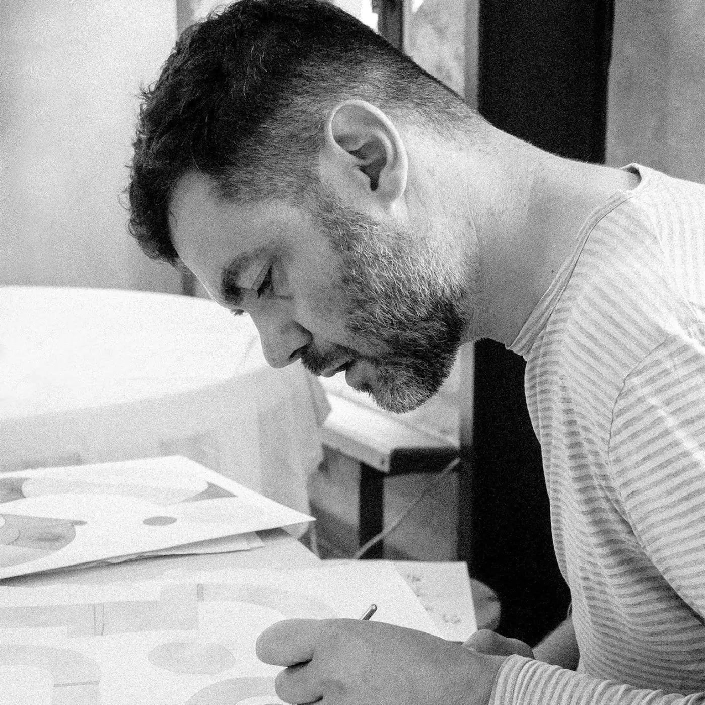 Artist Antony Squizzato working in his studio